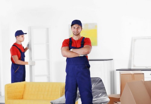 Removal team protecting furniture during a move