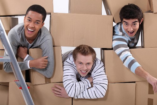 Professional movers completing a careful, secure delivery