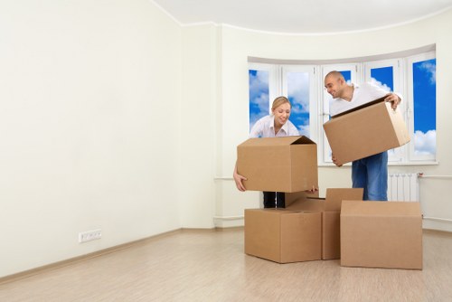 Supervisors checking safe loading procedures at a removals job