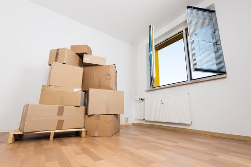 A smoothly organised Shepherdsbush removals process with packed boxes and furniture