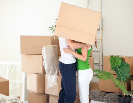 Packed office equipment ready for transport in West London