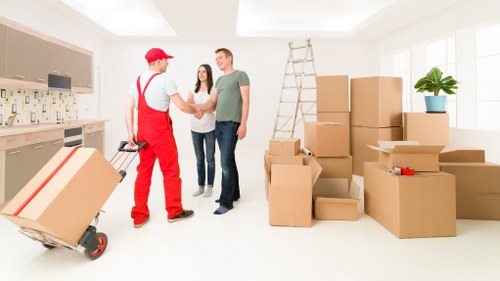 Packed boxes and furniture ready for transport during a move