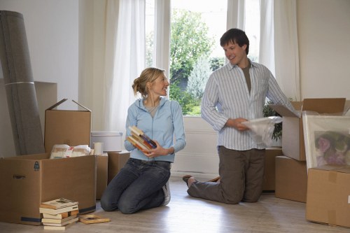 Furniture being carried carefully from a Shepherds Bush property