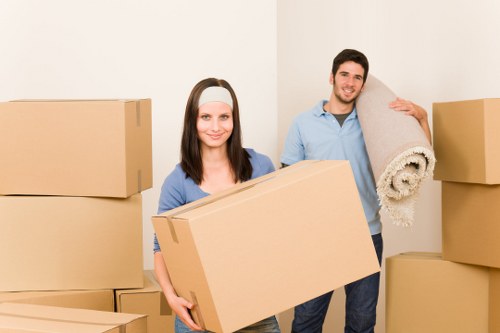 Packed moving boxes ready for transport in West London