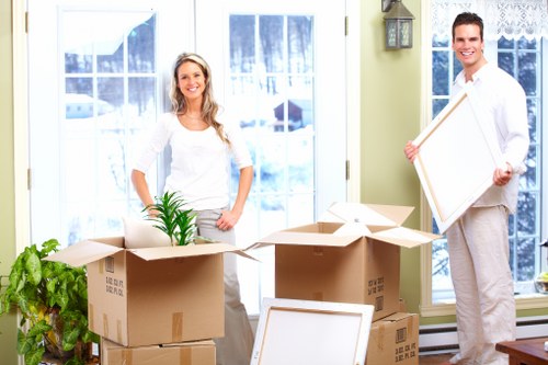 Professional house removal service handling belongings in Shepherds Bush
